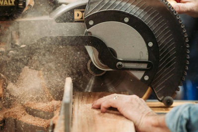 black and gray DEWALT miter saw